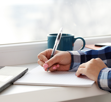 Person writing notes